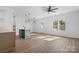 Bright living area featuring hardwood floors and an open kitchen at 140 3Rd Se Ave, Hickory, NC 28602