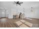 Open concept living space with kitchen island and hardwood floors at 140 3Rd Se Ave, Hickory, NC 28602