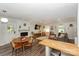 Inviting open-concept living space with a blend of living, dining, and kitchen areas, perfect for entertaining at 170 Woodcrest Rd, Mooresville, NC 28115