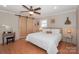 Serene bedroom featuring a sliding barn door closet and ample natural light at 170 Woodcrest Rd, Mooresville, NC 28115