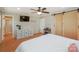 Spacious bedroom with ample storage, ceiling fan, and ensuite access at 170 Woodcrest Rd, Mooresville, NC 28115