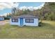 White house with a teal door and a spacious lawn at 2091 & 2095 Catawba River Rd, Fort Lawn, SC 29714