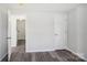 Spacious bedroom with wood-look floors and a large closet at 2091 & 2095 Catawba River Rd, Fort Lawn, SC 29714
