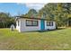 Small white house with teal door and propane tank at 2091 & 2095 Catawba River Rd, Fort Lawn, SC 29714