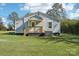 Ranch style home with light blue siding and a front porch at 2091 & 2095 Catawba River Rd, Fort Lawn, SC 29714