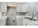 Gray kitchen with updated cabinets and a double sink at 2091 & 2095 Catawba River Rd, Fort Lawn, SC 29714