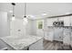 Renovated kitchen featuring white shaker cabinets and granite countertops at 2091 & 2095 Catawba River Rd, Fort Lawn, SC 29714