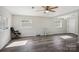 Bright living room with gray vinyl flooring and ceiling fan at 2091 & 2095 Catawba River Rd, Fort Lawn, SC 29714