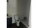 Bathroom featuring a toilet and stand-up shower with gray floor and shower tiling at 211 Brooklyn Ave, Lancaster, SC 29720