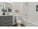 A bathroom featuring a shower over the tub, new vanity, and toilet at 211 Brooklyn Ave, Lancaster, SC 29720
