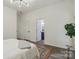Bright bedroom with hardwood floors, and an ensuite bathroom offering convenience and privacy at 211 Brooklyn Ave, Lancaster, SC 29720