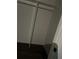 The closet contains a clothing rod, shelving, and wood floor at 211 Brooklyn Ave, Lancaster, SC 29720