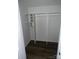 Empty closet with shelves, a rack for hangers, and hardwood floors at 211 Brooklyn Ave, Lancaster, SC 29720
