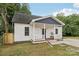 Charming exterior of a home with a inviting front porch and well-maintained lawn at 211 Brooklyn Ave, Lancaster, SC 29720