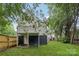 The back of the home features a porch, stairs, and backyard at 211 Brooklyn Ave, Lancaster, SC 29720