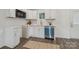 Modern kitchen featuring white cabinets, stainless steel appliances, and subway tile backsplash at 211 Brooklyn Ave, Lancaster, SC 29720