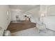 Open-concept living space with hardwood floors, abundant natural light, and modern furnishings at 211 Brooklyn Ave, Lancaster, SC 29720