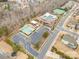 Aerial view of the community center showcasing the pool, playground, and basketball court at 2201 Bluebell Way, Tega Cay, SC 29708