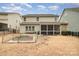 Backyard featuring a garden and screened in porch at 2201 Bluebell Way, Tega Cay, SC 29708