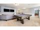 Game room with pool table and comfortable seating at 2201 Bluebell Way, Tega Cay, SC 29708