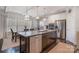Modern kitchen with a center island, stainless steel appliances, granite countertops, and dining table at 2201 Bluebell Way, Tega Cay, SC 29708