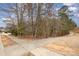 A view of the sidewalk and street intersection near the house at 2201 Bluebell Way, Tega Cay, SC 29708