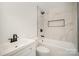 Modern bathroom with white vanity and marble shower surround at 2221 Finchley Dr, Charlotte, NC 28215