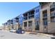 Modern building exterior with multiple units and parking at 2401 Euclid Ave # 110, Charlotte, NC 28203