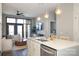 Open concept kitchen with island seating overlooking the living room at 2401 Euclid Ave # 110, Charlotte, NC 28203