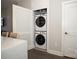 Stackable washer and dryer in a closet at 2401 Euclid Ave # 110, Charlotte, NC 28203