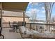 Relaxing back porch with comfortable seating overlooking the lake at 2498 Smith Harbour Dr, Denver, NC 28037