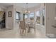 Bright breakfast nook featuring a large bay window with views of the water at 2498 Smith Harbour Dr, Denver, NC 28037