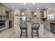 Well-equipped kitchen with a center island, granite countertops, and stainless steel appliances at 2498 Smith Harbour Dr, Denver, NC 28037
