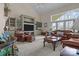 Spacious living room with a vaulted ceiling, custom built-ins, and comfortable leather furniture at 2498 Smith Harbour Dr, Denver, NC 28037