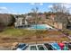 Beautiful community pool with boat docks, manicured lawn, and attractive waterfront homes in a desirable lakeside neighborhood at 2498 Smith Harbour Dr, Denver, NC 28037