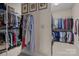 Organized walk-in closet with ample shelving and hanging space for clothing and accessories at 2498 Smith Harbour Dr, Denver, NC 28037