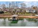 Waterfront house with a private dock and boat, offering direct lake access at 2498 Smith Harbour Dr, Denver, NC 28037
