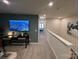 View of a hallway with a desk, chair and large wall-mounted television at 276 Laura Elizabeth Ln, Clover, SC 29710