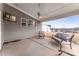 Relaxing covered patio with comfortable seating, ceiling fan, and outdoor TV at 3041 Winged Teal Ct, Belmont, NC 28012