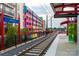 Modern transit stop in NODA with colorful mural and accessible rail lines for easy city transit at 3205 N Davidson St # 206, Charlotte, NC 28205