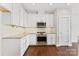 Modern kitchen with granite countertops and stainless steel appliances at 3273 Bending Birch Pl, Charlotte, NC 28206