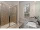 Modern bathroom with double vanity, granite countertop and shower at 3507 Spencer St, Charlotte, NC 28205