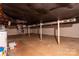 Unfinished basement with water heater and visible utilities at 3581 Thompson St, Newton, NC 28658