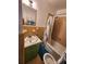 Bathroom with a green vanity, shower and toilet at 3581 Thompson St, Newton, NC 28658