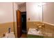 The bathroom has a toilet, sink, and vanity at 3581 Thompson St, Newton, NC 28658