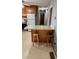 Kitchen features wood cabinets, a breakfast bar, and a floral countertop at 3581 Thompson St, Newton, NC 28658