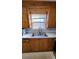 Kitchen sink and stainless steel appliances with wood cabinets at 3581 Thompson St, Newton, NC 28658