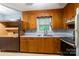 Kitchen with wood cabinets and laminate countertops at 3581 Thompson St, Newton, NC 28658