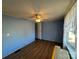 Simple bedroom with light blue walls and wood flooring at 3610 Becky Ln, Monroe, NC 28112