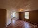 Bedroom with hardwood floors and access to the bathroom at 3610 Becky Ln, Monroe, NC 28112